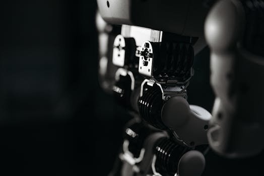 Detailed close-up of a robot's mechanical components, emphasized by moody studio lighting.